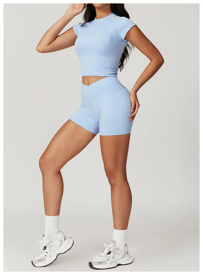 Ensemble de vêtements de sport pour femmes 2 pièces - Costume de sport - Vêtements d'entraînement - Haut court à manches courtes - Leggings taille haute - Vêtements de fitness.